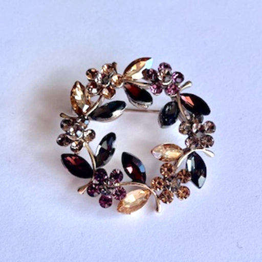 broche zilver bruin