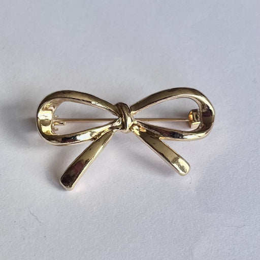broche strik goud