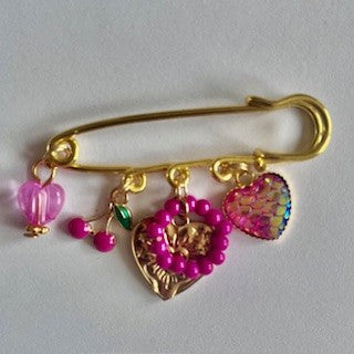 speld broche pink